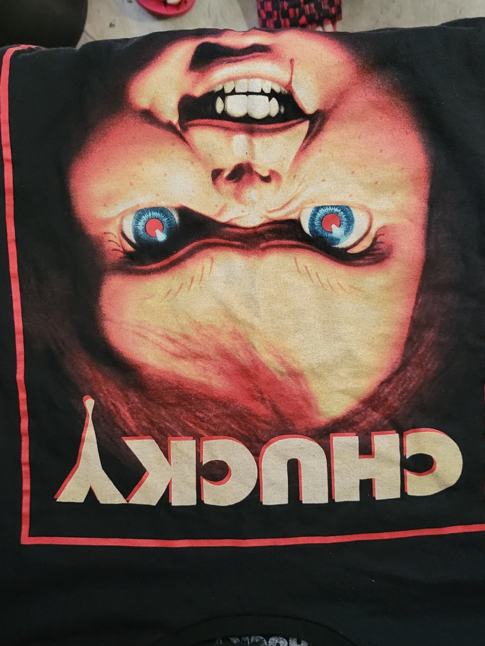 Chucky Graphic Tee with Red and Blue Accents